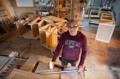 Antonio Garcia in front of his small carpentry business called Abzuya.