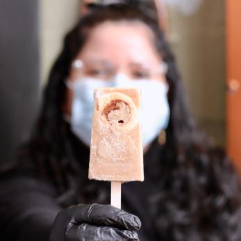 Rebecca Smith hold an Ice Queen pop
