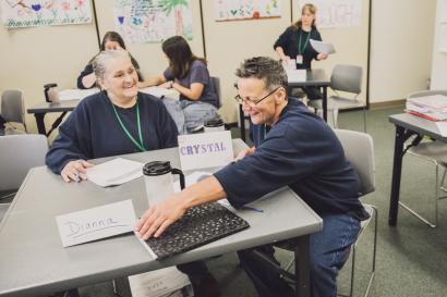 Two women working in a classroom