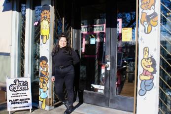 Rebecca smith, owner of the world’s only all-vegan popsicle shop,  stands outside her portland storefront.