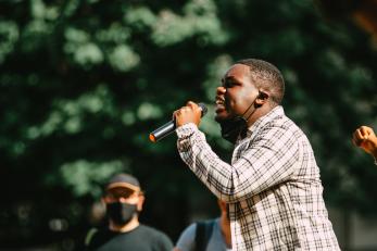 Black Lives Matter activist speaks to a crowd