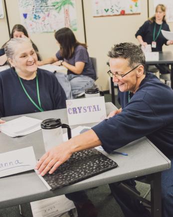 two women working in a classroom